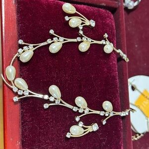 J.Dew Collection teardrop-shaped faux pearls and sparkling rhinestones.